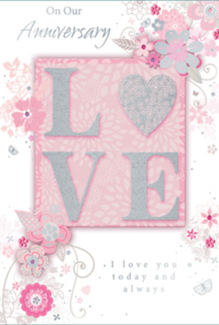 The anniversary card pictured feels like a romantic composition in paper, crafted with the same sensitivity a Hackney florist brings to a hand-tied arrangement. At the centre of the design, the word LOVE stretches proudly across the card, formed by bold, raised letters richly dusted with blush-pink and pearlescent white glitter, touched with hints of silver so that each stroke gleams as though lit by soft evening light. The embossing is clearly pronounced, offering a textured surface that invites a gentle touch, much like the velvety petals of a rose in a freshly made bouquet. Surrounding this central motif, a trail of stylised blossoms and leaves flows gracefully across the card, as if drifting in from a garden near Victoria Park. The flowers are drawn with fine, precise lines in shades of blush, ivory, and muted silver-grey, some petals filled with subtle shading that suggests depth, others outlined delicately to keep the design airy. These swirling botanical elements frame the word LOVE without overwhelming it, reminiscent of foliage carefully placed to embrace the focal blooms in a floral display. The background is a soft, continuous pink wash, slightly textural, giving the impression of a gentle glow behind the artwork. Below and around the florals, a thoughtful anniversary message appears in refined script, spaced to read clearly and calmly, reinforcing feelings of steadiness, commitment, and warmth. Overall, the card radiates the serenity of a long, shared journey-perfect for a couple in Hackney marking another year together with something as tender and understated as a bouquet delivered quietly to their door.